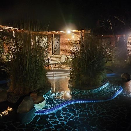 Termas De Папаякта Экстерьер фото The hot springs at night